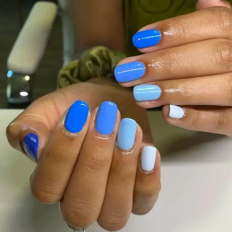 40+ Cute Blue Nail Designs You'll Love - StylePersuit Dark Blue To Light Blue Nails, Multi Colored Blue Nails, Fun Blue Nails Designs, Powder Blue Nails Designs, Blue Dipped Nails, Colorado Nails, Cute Blue Nail Designs, Blue Manicure Ideas, Different Shades Of Blue Nails