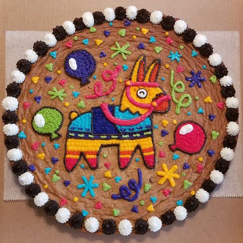 Fiesta cookie cake. Pinata cookie cake Taco Cookie Cake, Fiesta Cookie Cake, Cookie Cake Ideas Birthday, Great American Cookie Cake Designs, Cupcakes Mexicanos, Cookie Cake Decorating Ideas Birthdays, Birthday Cookie Cake Designs, Cookie Cakes Decorated, Cookie Cake Decorating Ideas