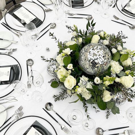 CANDY WEDDING STUDIOS. Design. Print. Hire | Not sure if you’ve noticed but disco balls are in 😂 🪩💃 Fresh florals, disco balls, our black rim chargers, cutlery, black napkins… | Instagram Disco Ball Table Centrepiece, Disco Ball Wedding Centerpiece, Disco Ball Table Centerpiece, Disco Ball Centerpiece Ideas, Candelabra Wedding Centerpieces, Wolf Christmas, Candelabra Wedding, Candy Wedding, Black Napkins