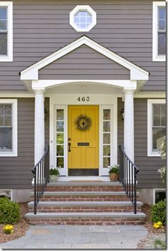 Gray exterior, White trim and Yellow door. These are the colors I want to paint our house House With White Trim, Yellow Front Door, Yellow Front Doors, Front Door Paint Colors, Gray House, Yellow Door, Door Paint Colors, Pintura Exterior, Yellow Doors