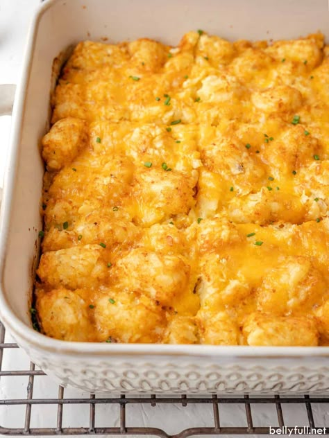 You’ll love this homestyle Breakfast Tater Tot Casserole recipe made with sausage, vegetables, eggs, cheese, and of course tater tots! Prep it ahead, make it the same day, or freeze it for later. Enjoy it for breakfast or dinner! Tater Tot Casserole Vegetarian, Breakfast Hotdish, Football Breakfast, Breakfast Tater Tot Casserole, Casserole Vegetarian, Easy Tater Tots, Xmas Morning, Postpartum Meals, Tater Tot Breakfast Casserole