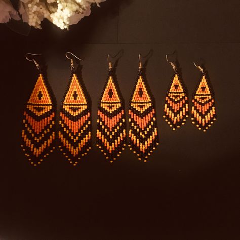 "These black orange fringed earrings pair amazingly with any outfit, dressy or casual. Colors: black orange long earrings Length: 4,5 inches (11,5 cm) Width: 1,2 inches (3 cm) medium earrings Length: 4,3 inches (11 cm) Width: 1 inches (2,5 cm) short earrings earrings Length: 3 inches (7,5 cm) Width: 0.8 inches (2,1 cm) Materials: Czech \"Preciosa\" beads Durable synthetic thread" Orange Fringe Earrings, Orange Seed Bead Earrings, Fall Seed Bead Earrings, Orange Beaded Earrings, Fall Beaded Earrings, Native American Beadwork Earrings, Fringe Bead Earrings, Fringed Earrings, Beaded Peacock