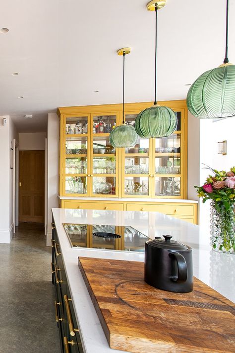 Green Glass Pendant Lights Over Kitchen Island, Yellow Pendant Light Kitchen, Bright Kitchen Island, Green Pendant Lights Over Kitchen Island, Dark Green Kitchen Island, Yellow Kitchen Island, Bora Hob, Kitchen Island With Hob, Dresser Long