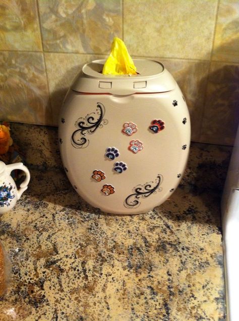 Tide Pod container spray painted, decorated and used for recycled grocery bags. Uses For Pod Containers, Reuse Tide Pods Container, Diy Tide Pod Containers Recycled, Tide Pod Container Reuse, Pod Container Crafts, Tide Pods Container Crafts, Laundry Bottles, Laundry Containers, Tide Pods Container