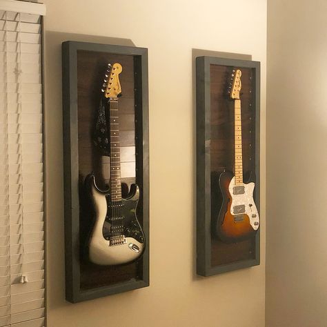 Hanging Instruments On Wall, Guitar Hanging Ideas, Guitar Room Decor, Guitar Display Wall, Guitar Stand Wall, Hanging Guitars, Guitar Display Case, Guitar Decorations, Music Room Design