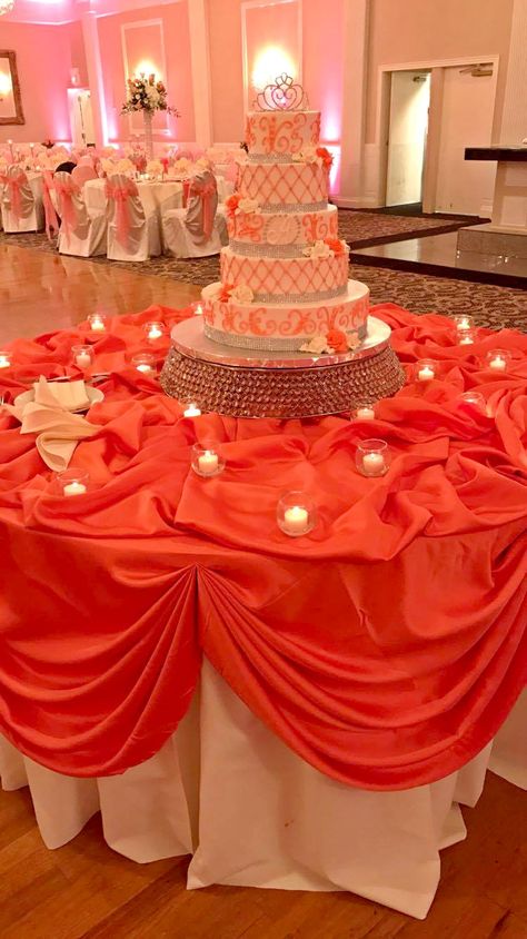 A beautiful 5 tiered cake with orange and white icing and a tiara on top! Sunset Themed Quince, Orange Quinceanera Theme, Sweet 16 Party Ideas Themes Orange, Sweet 16 Party Ideas Pink And Orange, Orange Quince, Orange Sweet 16, Orange Quinceanera, Cake Quinceanera, Pink Quince