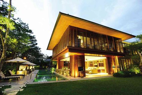 THE SECOND-FLOOR living room is surrounded by louver windows, screen panels, and tempered glass doors, which slide open to allow the panoramic view outside to wrap the vast room. Modern Filipino House, Philippine Architecture, Filipino House, Filipino Architecture, Architecture Facade, Philippine Houses, World Architecture Festival, Wallpaper Summer, Tropical Architecture