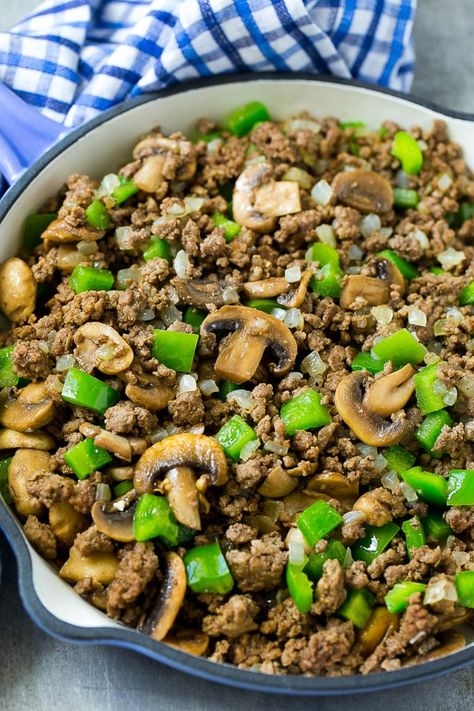 A skillet of browned hamburger meat, mushrooms, onions and bell peppers. Pepper Mushroom Recipe, Ground Beef Mushroom Recipe, Baked Beans With Hamburger, Ground Beef Mushrooms, Philly Cheesesteak Pasta, Recipes Using Hamburger, Cheesesteak Pasta, Green Onions Recipes, Ground Beef Breakfast