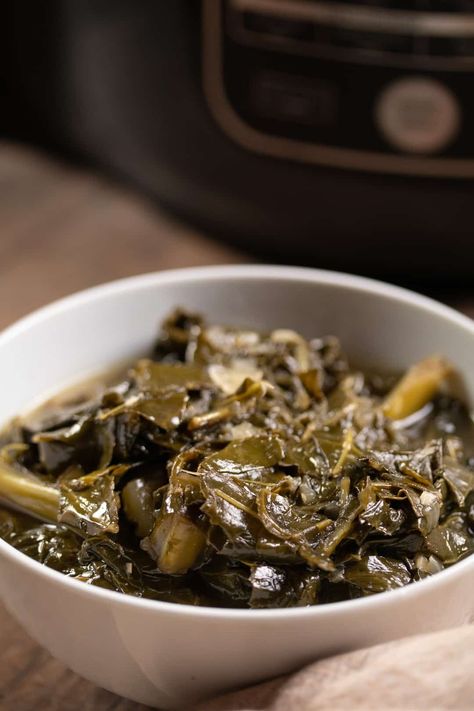 Vegan soul food is just as good and these pressure cooker collard greens don't disappoint! With using your Instant Pot, you will have this Southern classic ready in under an hour. It is easy to make and perfect to serve with some black eyed peas for Thanksgiving, New Year's, or Sunday dinner! Pressure Cooker Collard Greens, Instant Pot Collard Greens Recipe, Instant Pot Collard Greens, Crockpot Collard Greens, Vegan Collard Greens, Southern Style Collard Greens, Southern Collard Greens, Southern Greens, Collard Greens Recipe