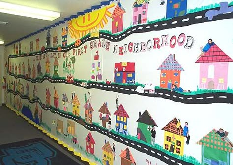 First Grade Neighborhood   First graders made houses with a construction paper collage. Neighborhood Bulletin Board, Neighborhood Houses, Social Studies Communities, Community Activity, Grade 1 Art, Communities Unit, Family Houses, Community Workers, Entrance Wall