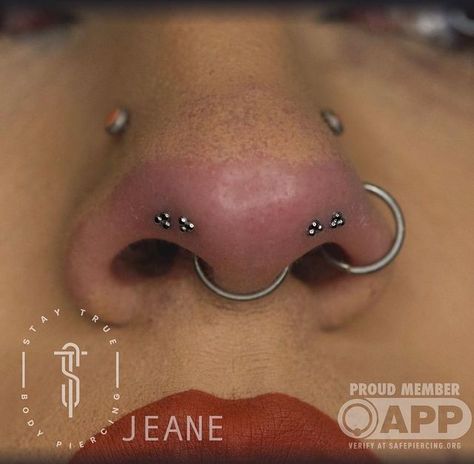 Jeane Bean on Instagram: "Some paired double very low nostril piercings I was able to experiment with on my bestie 🖤 • • Jewelry @duskbodyjewelry • • • • #diamondinthedaith #staytruebodypiercing #safepiercing #appmember" Symmetrical Facial Piercings, Triple Nose Piercing Different Sides, Double Nose Piercing Different Sides, Mantis Piercing, Piercing Ideas Face, Dimple Piercings, Bestie Jewelry, Back Dimple Piercings, Double Nose Piercing