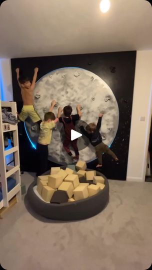 629K views · 21K reactions | DIY Moon Climbing Wall 🌙

A video of my 3 year old climbing the moon in his room has gone viral and there are countless people asking where they can buy it from. So I thought I’d show you this video of how we made it 🌙

I love that so many of you are inspired by this but Please contact a professional before attempting to make your own!

The foam pit is from @kiddymoon_official 
I put a fitted sheet from @dunelm over the foam.
We bought the climbing holds years ago, but there are plenty of you search online.
The neon light strip was from Amazon | Tori Lynch￼ | The Waterboys · The Whole of the Moon (2004 Remaster) Secret Hideout Room Ideas, Climbing Wall Kids Room, Climbing Wall Kids, Foam Pit, Diy Moon, Kids Climbing, Climbing Holds, Big Kids Room, Rock Climbing Wall