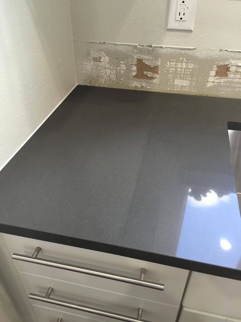 Wall and counter seams Dark Gray Quartz Countertops, Gray Kitchen Countertops, Quartz Bathroom Countertops, Gray Quartz Countertops, Replacing Kitchen Countertops, Kitchen Remodel Countertops, Outdoor Kitchen Countertops, Dark Grey Kitchen, Gray And White Kitchen