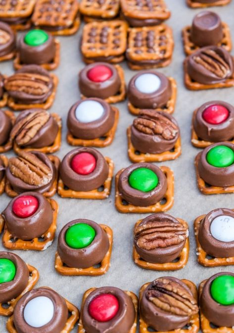 Easy Rolo Pretzel Bites Recipe - The Foodie Affair Pretzel Rolo Bites Christmas, Pretzel Rolo Pecan Recipe, Pretzel Hershey Kiss M&m Rolo, Christmas Rolo Pretzels, Pretzel With Rolos, Pretzel And Rolo Turtles, Pretzel Rollo M&m, Pretzel Rolos M&m, Rolo Cookies Pretzel