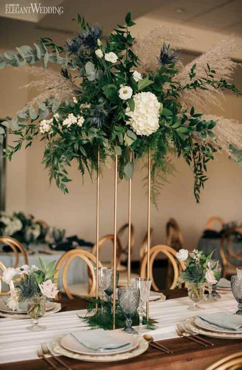 Green Wedding Centerpieces, Tall Centerpiece, Tall Wedding Centerpieces, Tafel Decor, Dusty Blue Wedding, Flowers And Greenery, Wedding Floral Centerpieces, Tall Centerpieces, Wedding Inspired