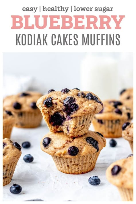 Looking for a power-packed muffin recipe? Whip up a batch of these high protein Blueberry Kodiak Cakes Muffins! These delicious blueberry banana pancake muffins are whole grain, easy to make, and most importantly, taste amazing. Perfect for a healthy snack or quick breakfast! {Vegetarian} Kodiak Cakes Blueberry Protein Muffins, Protein Banana Blueberry Muffins, Kodiak Blueberry Muffins Weight Watchers, Macro Friendly Blueberry Muffins, Kodiak Protein Mini Muffins, Kodiak Cake Blueberry Muffins, Kodiak Blueberry Muffin Mix Recipes, Kodiak Pancake Mini Muffins, Macro Friendly Muffin Recipes