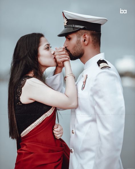 LOVE is the only thing where the strength of a mariner originates..!! #navylife #couplelove #bokehads #outdoorshoots #preweddingshoot #kochi #indiannavy #navyfamily #marinerslove #ship #coupleposes #couplegoals #northindianwedding #sareelove #redsaree #life #photography #candids#wittyvows #sailorlove #sailorcouple #lovefornavy #navywife #seagirl #sailor #indiannavy #coolmariners #lifeonship #ship Navy Couple Pictures, Army Couple Photography, Military Couple Photography, Navy Couple, Army Photography, Photography Stills, Man In Uniform, Army Couple Pictures, Army Couple