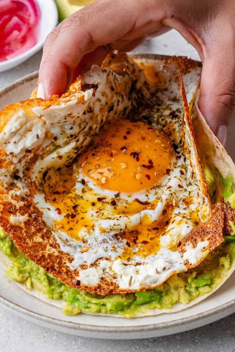 These Crispy Feta Fried Eggs will be your new obsession! With a golden feta cheesy crust and a perfectly cooked egg, it's the ultimate breakfast that'll keep you coming back for more! Crispy Feta, Feta Eggs, Fried Egg Recipes, Ultimate Breakfast, Food Carving, New Obsession, Fried Eggs, Food Goals, Easy Family Meals