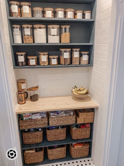 Modern pantry organizing. Glass and wood canisters. Baskets. Pedestal fruit bowl. DIY pantry remodel. Follow my shop @hostessology on the @shop.LTK app to shop this post and get my exclusive app-only content! #liketkit #LTKhome #LTKFind #LTKstyletip @shop.ltk https://liketk.it/3YogC