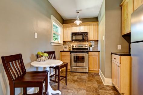 (Credit: Iriana Shiyan/Shutterstock) Narrow Room, Best Wall Paint, Maple Kitchen Cabinets, Small Kitchen Design, Narrow Rooms, Maple Kitchen, Best White Paint, Maple Cabinets, Kitchen Wall Colors