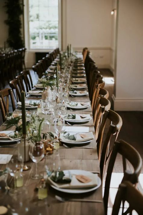 Aswarby Rectory wedding with Enzoani lace and tulle wedding dress and foliage decor and details by Rosie Kelly Photography and Skinny Boy Films Wedding Table Decor With Candles, Table Decor With Candles, Decor With Candles, Enzoani Wedding Dress, Rustic Wedding Table Setting, Wooden Trestle Table, Lace And Tulle Wedding Dress, Simplistic Wedding, Foliage Decor