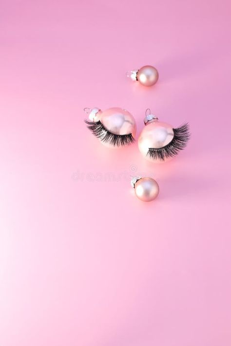 False eye lashes on Christmas ball on pink background, copy space royalty free stock images Background Eyelash, Christmas Lashes Wallpaper, Lashes Background, Christmas Lash Post, Pink Lash Background, Quotes Pink Background, Lashes Christmas, Christmas Lashes, Pink Lash Post