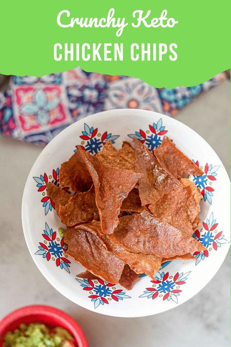 a plate of chicken chips with guacamole on the side Chicken Chips Recipe Keto, Chicken Chips Keto, Wilde Protein Chips, Chicken Chips Recipe, Keto Chicken Nuggets Canned Chicken, Carnivore Chips Recipe, Protein Chips Homemade, Crunchy Keto Snacks, Protein Chips Recipe