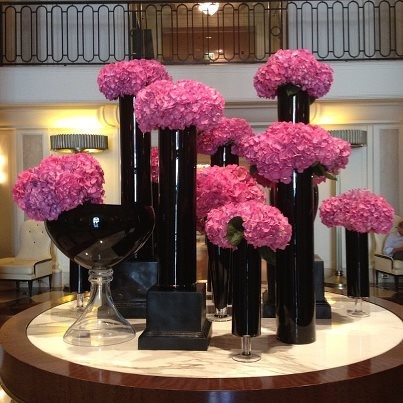 Pink hydrangeas represent grace and acceptance. But do not be fooled; hydrangeas don't always accept other flowers. For instance, never mix calla lilies with hydrangeas because lilies secrete a fluid that kills hydrangeas. Hotel Flower Arrangements, Jeff Leatham, Hotel Flowers, Pink Hydrangeas, Corporate Flowers, Modern Flower Arrangements, Flowers Arrangements, Pink Hydrangea, Flower Display