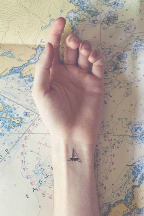 A ship tattoo, no matter the size or design, usually symbolizes the same thing: a journey or an adventure. This is a great little tattoo to represent life and the epic journey we all take. Sailboat Tattoo, Sailor Tattoos, Tattoo Tiny, Tattoos For Girls, Small Tattoos With Meaning, Semicolon Tattoo, Tattoo People, Cute Tiny Tattoos, Ship Tattoo