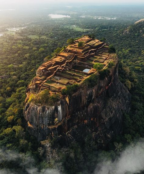 Commence on a journey to Sri Lanka and uncover the ancient wonder of Sigiriya! Marvel at the majestic Lion Rock, explore the intricate frescoes and take in panoramic views that will leave you breathless. Adventure, history, and beauty all in one incredible destination. 🏞️🦁 #VisitSriLanka #SigiriyaAdventure #AncientWonder #srilanka #DiscoverSriLanka #VisitSriLanka #TravelWithUs #SriLankaBeauty #ExploreSriLanka #srilankatravel #greenholiday #TravelGoals #SriLankanParadise #UnforgettableAdvent... Beauty Of Sri Lanka, Lion Rock Sri Lanka, Sri Lanka History, Srilanka Aesthetic, Sri Lanka Aesthetic, Tamil Eelam, History Of Sri Lanka, Sigiriya Sri Lanka, Sigiriya Rock