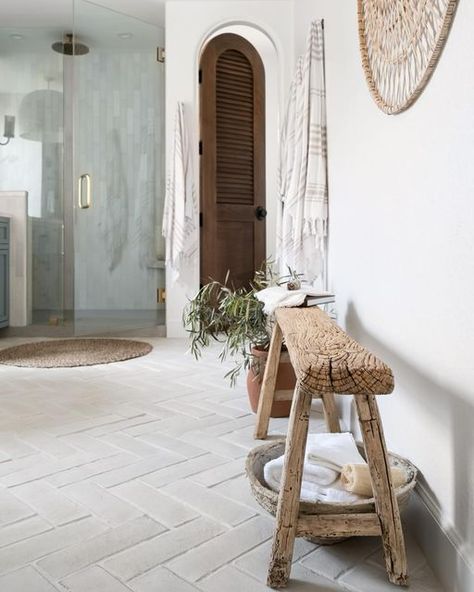 Audrey Crisp on Instagram: "{FEATURE} I love this bathroom Reno! Such a pretty space! I love the arched wood door and herringbone floor tiles! Swipe for the before! Design: @kerimichelleinteriors 📷: @jamesfurman.interiors . . . Folks along @audreycrispinteriors for more interior design inspo! . . . . . . . . . #doingneutralright #modernfarmhouse #apartmenttherapy #theeverygirlathome #showemyourstyled #inmydomaine #cljsquad #smmakelifebeautiful #hometohave #simplystyleyourspace #currentdesignsituation #pocketofmyhome #howyouhome #makehomeyours #makehomematter #sodomino #IDCOathome #mymodernlook #ispyraddesign #ggathome #lonnyliving #omysa #laurenconradcoloves #bathroomdesign #bathroomreno #bathroomrenovation" Bathroom Flooring Herringbone, Bathroom Herringbone Tile Floor, Herringbone Tile Floor Bathroom, Herringbone Tile Bathroom Floor, Bathroom Herringbone Tile, Herringbone Bathroom Tile, Herringbone Floor Tiles, Herringbone Bathroom Floor, Herringbone Tile Floor