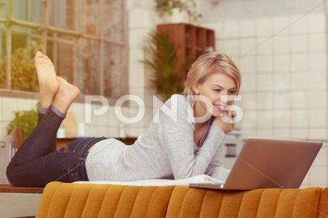 Person Lying On Stomach Reference, Lying Down On Stomach Reference, Lying On Stomach Pose, Table Behind The Couch, Free College Courses Online, Free College Courses, Online College Classes, Behind The Couch, Blond Woman