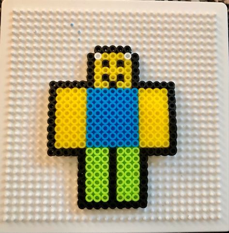 Roblox noob perler beads Perler Beads Roblox Patterns, Kandi Patterns Perler Beads, Aesthetic Melty Beads, Roblox Perler Bead Patterns, Roblox Perler Beads, Iron Beads Ideas Aesthetic, Tyler The Creator Perler Beads, Funny Perler Beads, Meme Perler Beads