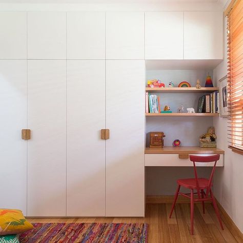 A simple, small-space, gender neutral kids room where storage and furnishings are built in and to the ceiling with red desk chair from @temperaturedesign and floor cushions from @tombo. Another warm and friendly spot in our #collingwoodcompactproject  #Regram via @braveneweco Kids Room Wardrobe Design, Space Gender, Room Wardrobe Design, Bedroom Storage For Small Rooms, Gender Neutral Kids Room, Neutral Kids Room, Red Desk, Bedroom Built In Wardrobe, Bedroom Cupboard