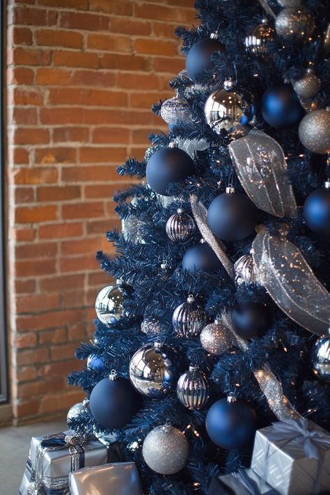 31 Magical Blue Christmas Tree Ideas That Go Beyond Basic Baubles Navy White Christmas Tree, Christmas Tree With Blue And Silver Ornaments, Black Blue Silver Christmas Tree, Denim Blue Christmas Tree, Navy White Silver Christmas Tree, Blue Silver Christmas Tree Ideas, Navy Blue Ornaments Christmas Tree, Christmas Tree Blue Theme, Navy And Silver Christmas Tree