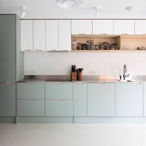 The cool palette of white and light sage fronts with a stainless steel worktop is countered with the warmer tones and texture of open birch… | Instagram Steel Worktop Kitchen, Stainless Steel Worktop, Sage And White Kitchen, Wood Bench Seating, Seafoam Kitchen, Pistachio Kitchen, Scandi Kitchen Ideas, Light Kitchen Colors, Light Green Kitchen