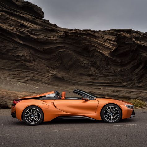 A new convertible sports car is joining German company BMW's range of hybrid electric vehicles. Bmw I8 Convertible, Convertible Sports Cars, Bmw I8 Roadster, I8 Roadster, Electric Sports Car, Bmw I, Bmw I8, Bmw Models, Nice Cars