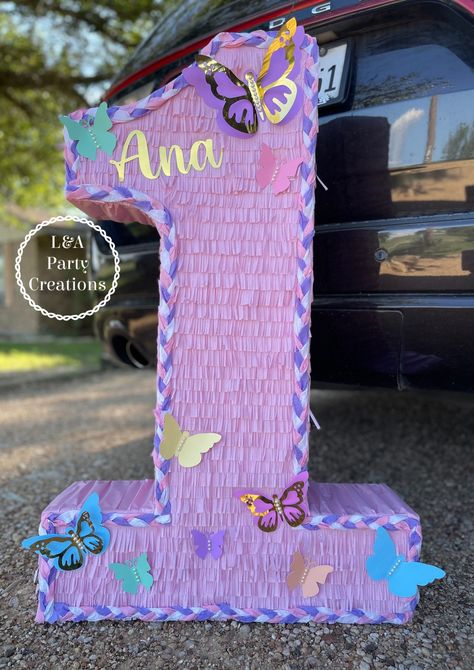 How To Make A Butterfly Pinata, One Piñata Number, Purple Pinata, Piñata Making, Butterfly Pinata, Number One Pinata, One Pinata, Butterfly 1st Birthday, Butterfly Themed Birthday Party