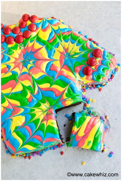 Learn how to make a tie dye cake (shirt cake), using this step-by-step tutorial. Easy to make with rainbow colored frosting and toothpicks! Great for Father's Day! If you remember this Shirt Cake from a few years ago, today's version is just a different spin on it. It uses an ugly sweater cake pan instead of a round cake pan and the decorations are done with frosting instead of fondant. You don't need any fancy tools or equipment to decorate this cake. All you need is rainbow colored ... Tie Dye Buttercream Frosting, Tie Dye Frosting, Tye Dye Cake, Ugly Sweater Cake, Sweater Cake, Tie Dye Cake, Colored Frosting, How To Make A Tie, Shirt Cake