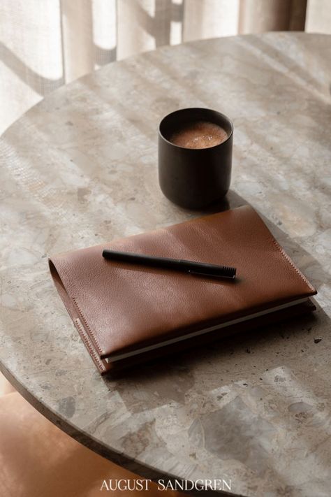 This Notebook pays homage to August Sandgren’s heritage of book binding. It can hold all your ideas, scribbles, and mind-clutter. Meant to last forever, this leather Notebook is created with changeable paper inside. It comes with the first paper notebook inside. #notebook #design #covers Notebooks Photography Ideas, Notebook Photography Ideas, Notebooks Photography, Notebook Photoshoot, Photography Notebook, Pen Photography, Notebook Photography, Luxury Notebook, Ar Photography