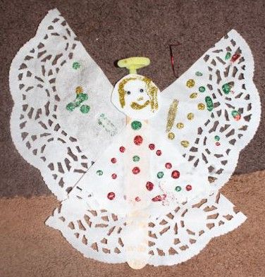 Doilies make pretty angel wings and skirts. We cut a triangular section from a doily, and used this piece as the angel’s skirt, while the rest of the doily was turned upside down and became t… Doily Angel Craft, Paper Doily Crafts Christmas, Doily Angels, Kids Church Christmas, Paper Doily Crafts, Kindergarten Christmas Crafts, Childrens Christmas Crafts, Tongue Depressors, Kindergarten Christmas