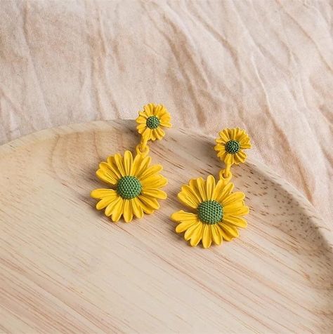 Brighten up your day with a touch of sunshine! Our yellow sunflower earrings are a cheerful accessory to add a pop of colour and joy to any outfit🌻☀️ ksh 500 Sunflower Accessories, Popular Earrings, Sunflower Earrings, Daisy Earrings, Yellow Sunflower, Accessories Shop, Women's Earrings, Color Pop, Sunflower