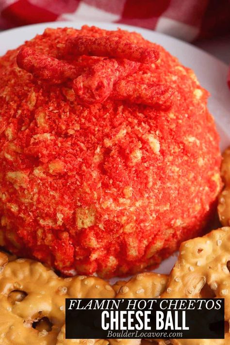 This spicy cheese ball recipe is a perfect party appetizer. It's one of those yummy appetizers that's perfect for holiday parties, Halloween parties, and whenever you need easy appetizer recipes. A classic cream cheese ball bursting with spicy flavor from delicious ingredients and a Flamin' Hot Cheetos coating! Birria Cheese Balls, Valentine Cheese Ball, Hot Cheeto Cheese Ball, Chicken Cheeto Balls, Cream Cheese Dessert Ball, Hot Cheetos Jambalaya Balls, Flamin Hot Cheetos Recipe, Hot Cheetos Boudin Balls, Hot Cheetos Balls