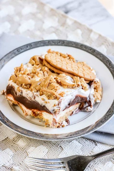 Chocolate Nutter Butter Icebox Cake, Nutter Butter Lasagna, Nutter Butter Lasagna Desserts, Nutter Butter Recipes, Nutter Butter Cake, Nutter Butter Dessert, Chocolate Lasagne, Pudding Desserts Layered, Chocolate Lasagna Recipe