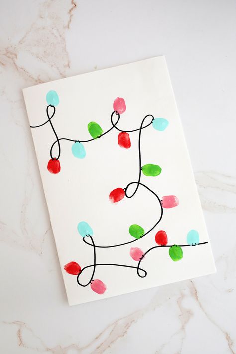 Christmas Handprint Art Ideas - Childhood Magic Finger Print Christmas Light Craft, Fingerpainting Christmas Art, Thumb Print Christmas Art, Toddler Christmas Painting Ideas, Christmas Finger Print Art, Finger Painting Christmas, Christmas Crafts For Kids Handprint, Canvas Hand Print Ideas, Christmas Thumbprint Art