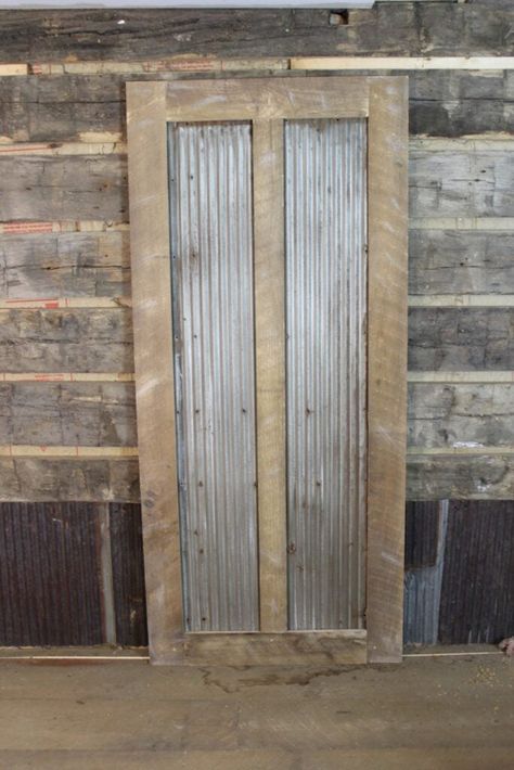 10 Smart and Easy Ways to Decorate with Corrugated Metal - Bob Vila Corrugated Metal Door, Doors Room, Rustic Metal Decor, Custom Barn Doors, Rustic Door, Rustic Kitchen Island, Door Picture, Room Divider Doors, Rustic Doors