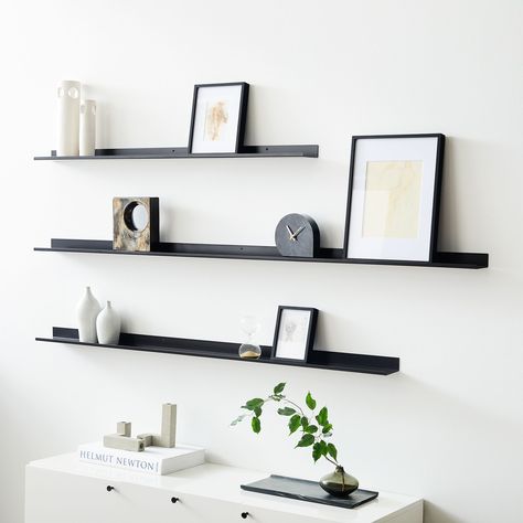 Floating Lines Metal Ledges | West Elm Long Black Floating Shelves, Black Metal Floating Shelves, Shelves Above Credenza, Black Wood Floating Shelves, Floating Shelves Office Decor, Metal Shelf Design, Game Shelves, Floating Display Shelves, Youtube Room