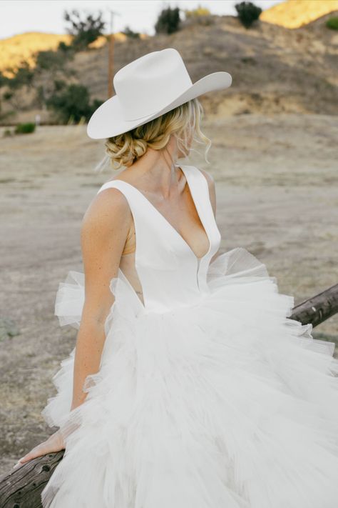 City Boot cowboy boots ross wedding dress rita vinieris Authentic fun candid wedding photography Artistic wedding photography Western bridal designs with ruffles fashion photography bridal portraits bridal western aesthetic editorial bridal portraits bride photos wedding dress dream wedding nature editorial bride engaged stetson cowboy hat wedding black and white photographer photo by @Kristakphotos Western Wedding Aesthetic, Cowboy Hat Wedding, Photoshoot Western, Nature Editorial, Aesthetic Editorial, Aesthetic Bride, Editorial Bride, Bridal Aesthetic, Rita Vinieris