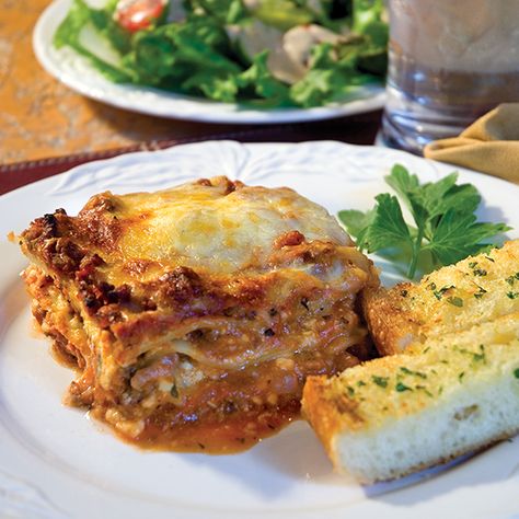 This meat lasagna has both ground beef and mild sausage for extra Italian flavor. Paula Deen Lasagna, Lasagna With Sausage And Beef, Paula Deen Lasagna Recipe, Meat Sauce Lasagna Recipe, Lasagna Recipe Sausage, Lasagna Recipe Without Sausage, Paula Dean Lots Of Meat Lasagna, Lasagna No Meat Recipe, Lasagna With Ricotta