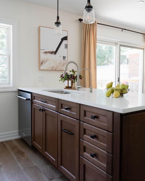 Dark Wood Island & Caesarstone Quartz Countertops, Engineered Hardwood Flooring, Chrome Faucet, Matte Black Cabinet Hardware, Filtered Water Faucet, Kitchen Peninsula Black Hardware On Brown Cabinets, Dark Wood Cabinets With Black Hardware, Cherry Cabinets Black Hardware, Hardware For Dark Wood Cabinets, Dark Oak Kitchen Cabinets, Dark Wood Island, Matte Black Cabinet Hardware, Caesarstone Quartz Countertops, Dark Oak Cabinets